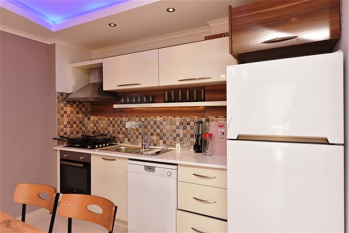 Квартира 1+1 в районе Махмутлар на расстоянии всего 350 метров до моря 