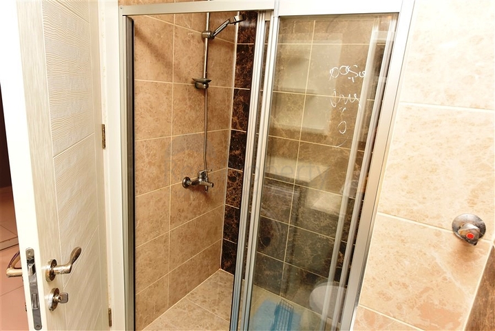 Квартира 1+1 в районе Махмутлар на расстоянии всего 350 метров до моря 