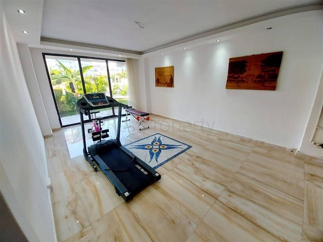 Квартира 1+1 в районе Махмутлар на расстоянии всего 350 метров до моря 