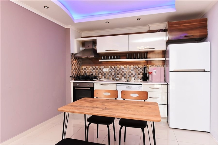 Квартира 1+1 в районе Махмутлар на расстоянии всего 350 метров до моря 