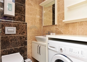 Квартира 1+1 в районе Махмутлар на расстоянии всего 350 метров до моря 