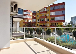 Квартира 1+1 в районе Махмутлар на расстоянии всего 350 метров до моря 