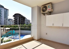 Квартира 1+1 в районе Махмутлар на расстоянии всего 350 метров до моря 