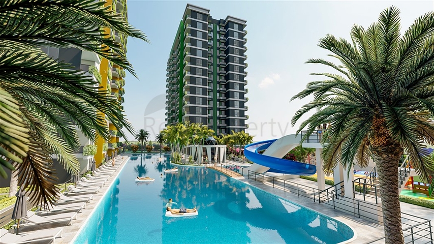 Инвестиционный проект в районе Эрдемли в 200 м от моря