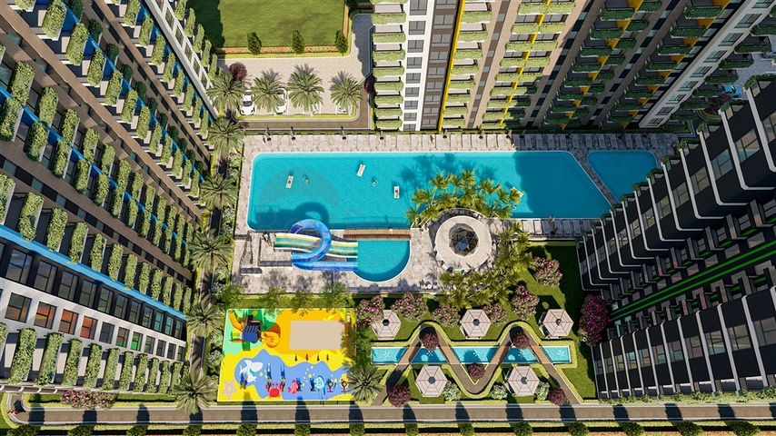 Инвестиционный проект в районе Эрдемли в 200 м от моря