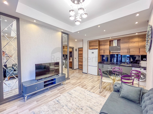 Квартира 1+1 в премиальном комплексе, район Махмутлар