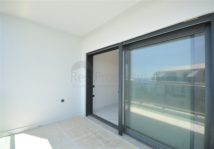 Квартира 1+1 у самого берега моря в районе Каргыджак