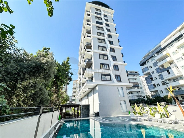 Квартира 1+1 с превосходной инфраструктурой в районе Махмутлар