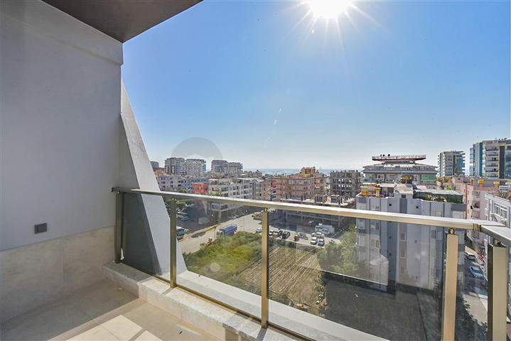 Квартира 1+1 с превосходной инфраструктурой в районе Махмутлар