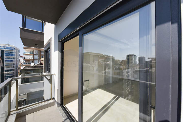 Квартира 1+1 с превосходной инфраструктурой в районе Махмутлар