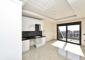 Квартира 1+1 с превосходной инфраструктурой в районе Махмутлар