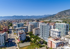 Квартира 1+1 с превосходной инфраструктурой в районе Махмутлар