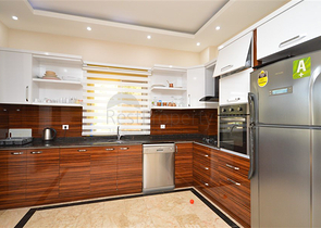 Вилла в сите 4+1 с небольшим садом и видом на море и горы в живописном районе Каргыджак