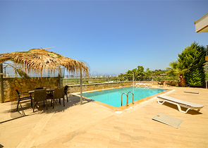 Вилла в сите 4+1 с небольшим садом и видом на море и горы в живописном районе Каргыджак