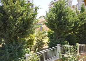 Вилла в сите 4+1 с небольшим садом и видом на море и горы в живописном районе Каргыджак