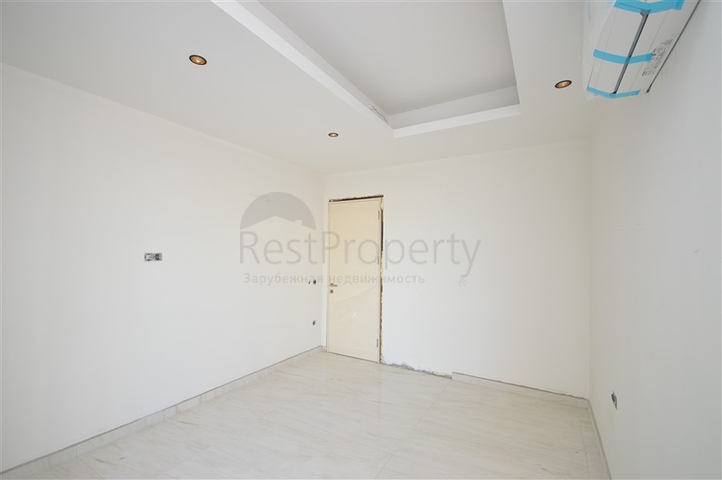 Квартира 1+1 в комплексе премиум класса на первой береговой линии в Махмутларе