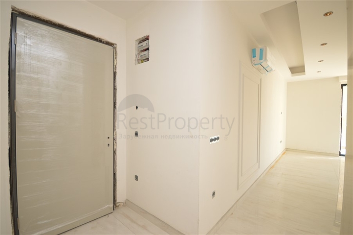 Квартира 1+1 в комплексе премиум класса на первой береговой линии в Махмутларе