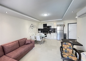 Двухкомнатная светлая квартира в районе с лучшим песчаным пляжем в Авсалларе