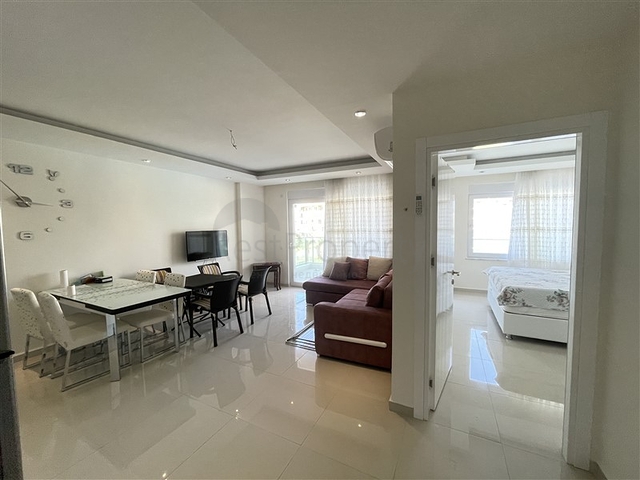 Квартира 1+1 в популярном жилом комплексе в районе Авсаллар