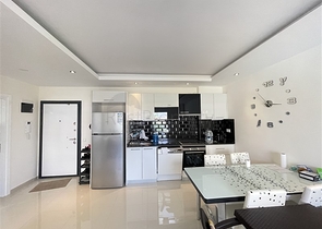 Квартира 1+1 в популярном жилом комплексе в районе Авсаллар