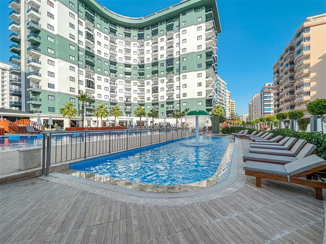 Меблированная квартира планировкой 2+1 в популярном районе Махмутлар