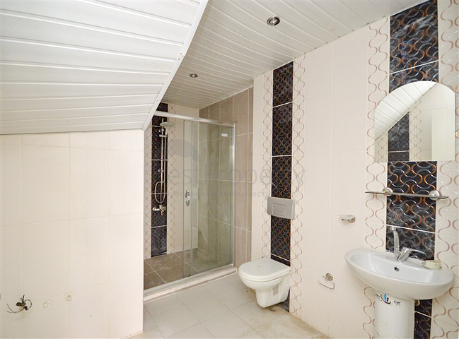 Пентхаус планировки 7+1 с отдельной кухней в центре Алании