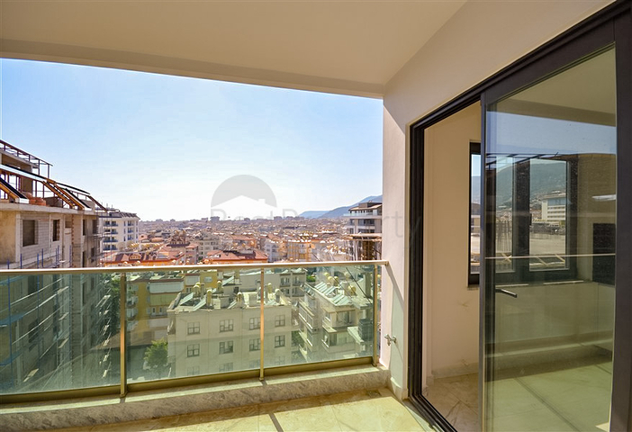 Двухэтажный пентхаус 3+1 с закрытым паркингом и видом на море в Алании