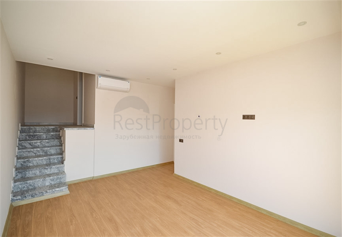 Двухэтажный пентхаус 3+1 с закрытым паркингом и видом на море в Алании