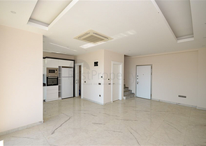 Двухэтажный пентхаус 3+1 с закрытым паркингом и видом на море в Алании