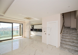 Двухэтажный пентхаус 3+1 с закрытым паркингом и видом на море в Алании