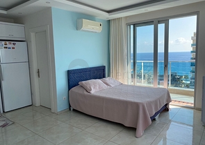 Квартира – студия на первой береговой линии в Махмутларе