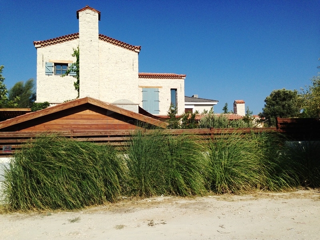 Вилла с большим участком с зеленым садом в Алачаты