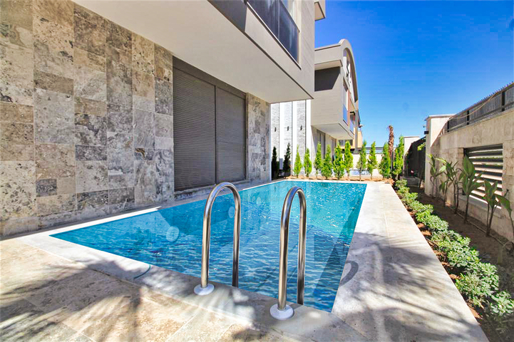 Вилла планировки 6+1 в микрорайоне Гюзельоба - Анталия