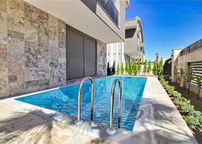 Вилла планировки 6+1 в микрорайоне Гюзельоба - Анталия