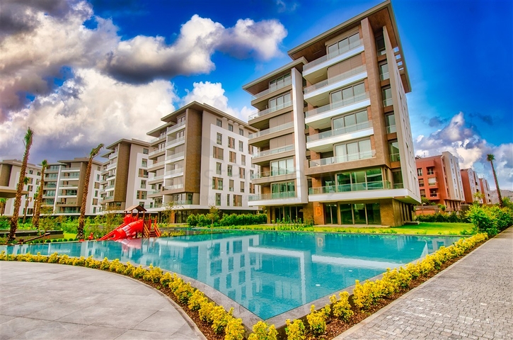 Квартира планировки 3+1 в микрорайоне Гюрсу - Анталия