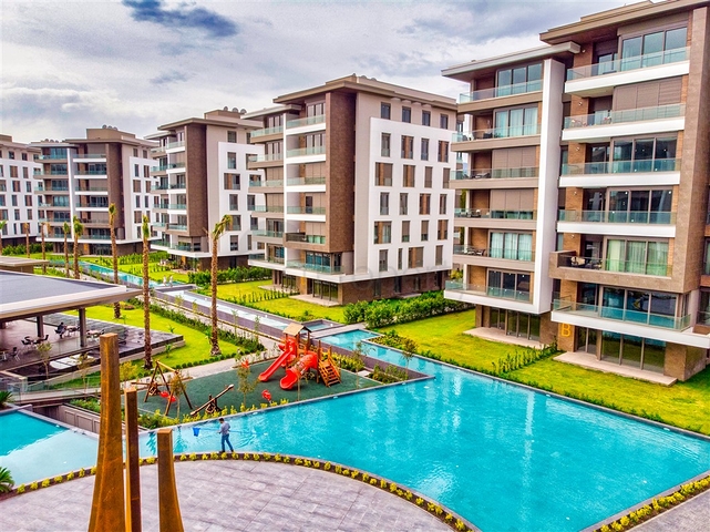 Квартира планировки 3+1 в микрорайоне Гюрсу - Анталия