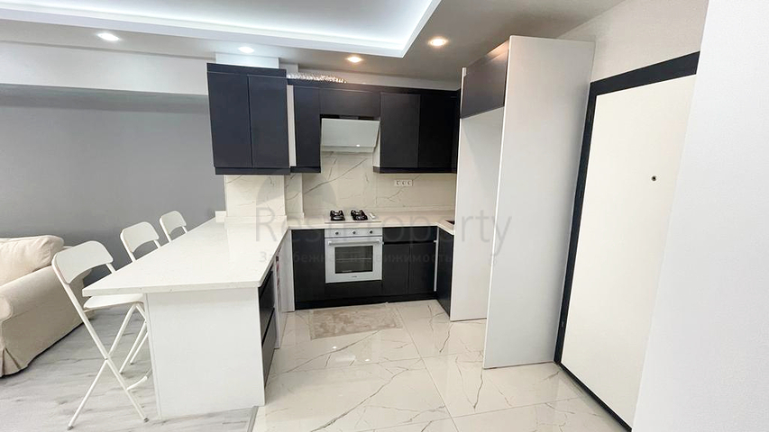 Квартира планировки 2+1 в центре города Анталия 