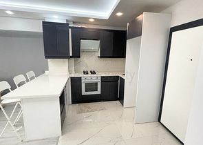 Квартира планировки 2+1 в центре города Анталия 