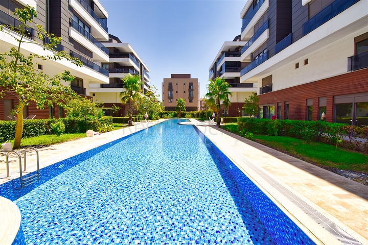 Квартира планировки 3+1 в микрорайоне Унджалы - Анталия 