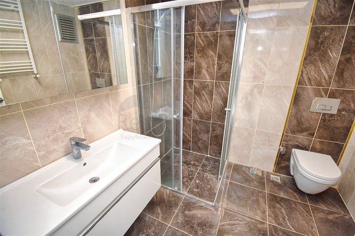 Квартира планировки 3+1 в микрорайоне Унджалы - Анталия 