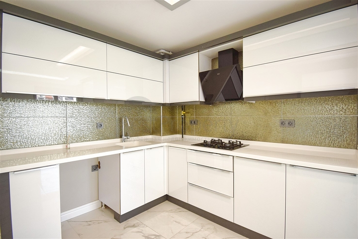 Квартира планировки 3+1 в микрорайоне Унджалы - Анталия 