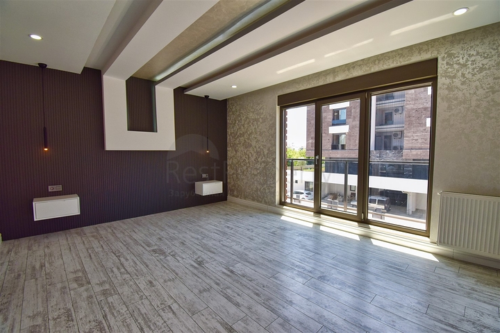 Квартира планировки 3+1 в микрорайоне Унджалы - Анталия 