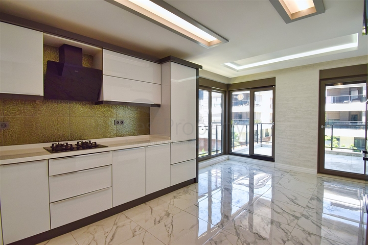 Квартира планировки 3+1 в микрорайоне Унджалы - Анталия 