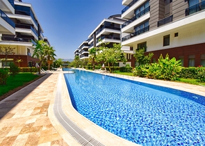 Квартира планировки 3+1 в микрорайоне Унджалы - Анталия 