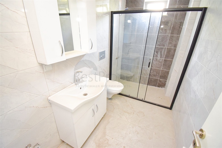 Квартира планировки 2+1 в центре города Анталия 