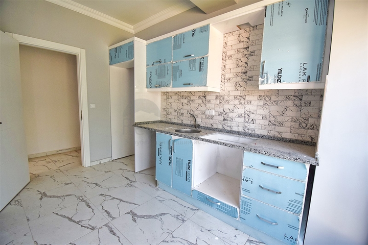 Квартира планировки 2+1 в центре города Анталия 