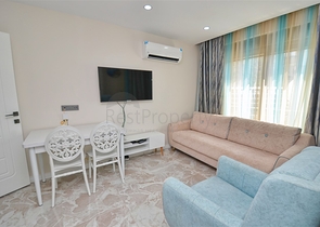 Квартиры планировки 1+1  в микрорайоне Сарысу - Анталия 