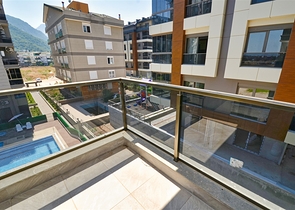 Квартиры планировки 1+1  в микрорайоне Сарысу - Анталия 