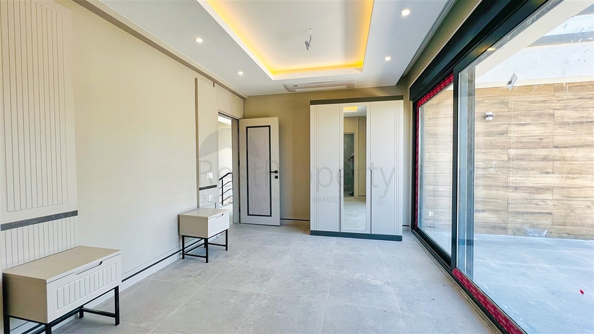 Великолепная вилла планировки 4+1 в районе Кемер - Анталия 