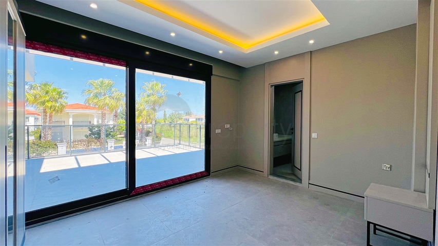 Великолепная вилла планировки 4+1 в районе Кемер - Анталия 